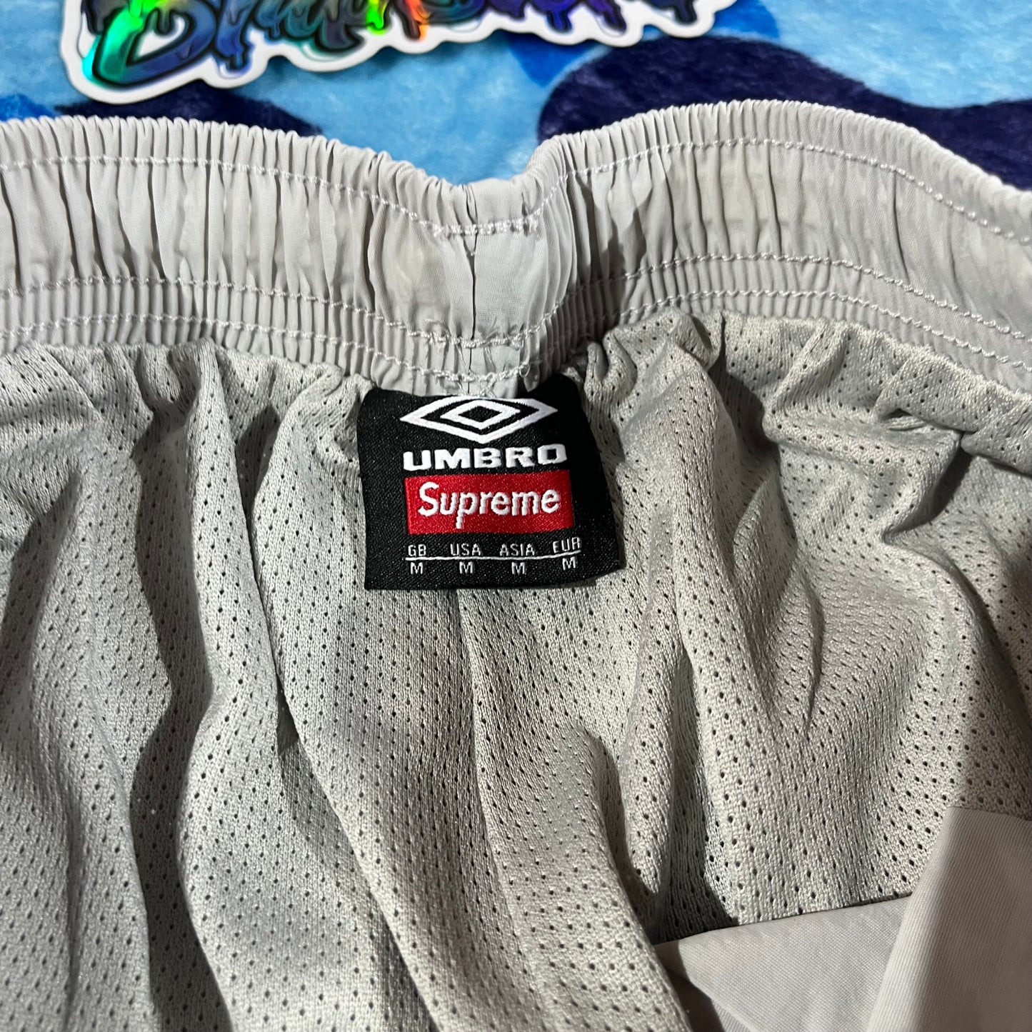 Conjunto Supreme X Umbro Gris M