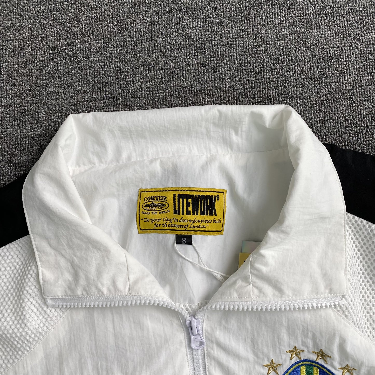 corteiz-brasil-olympic-shuku-jacket-white-4-Drip Store Argentina