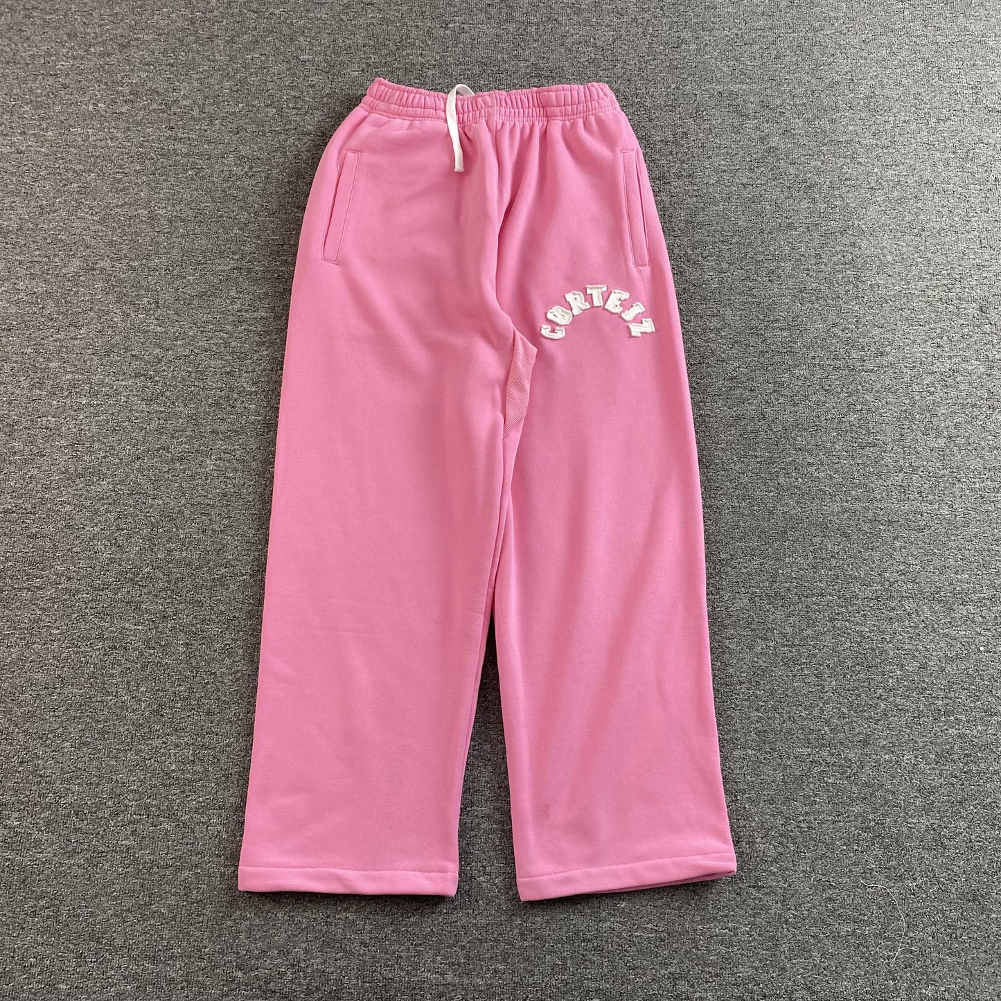 Corteiz Colly Arch Open Hem Pants Pink
