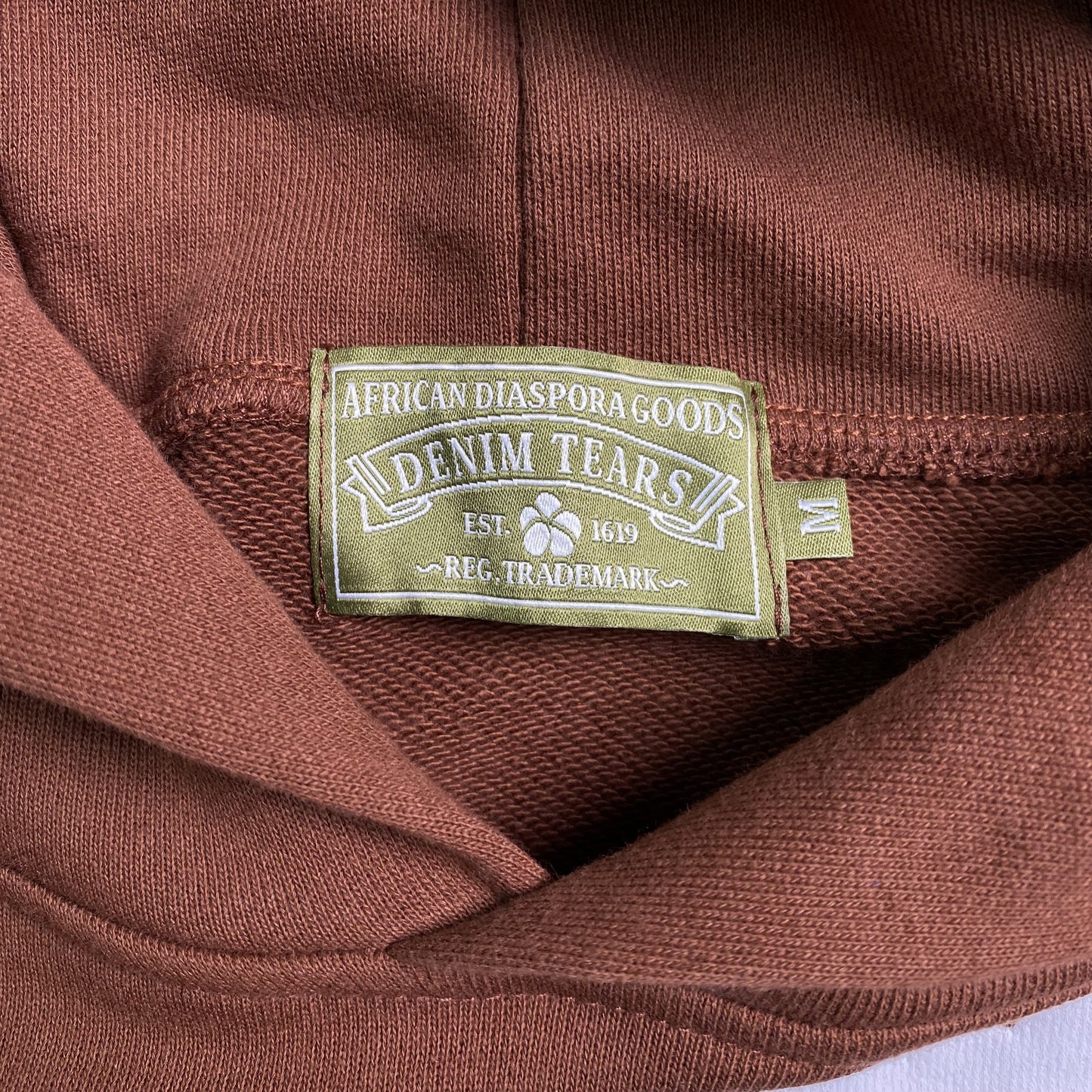 DENIM TEARS THE COTTON WREATH HOODIE BROWN-Drip Store Argentina