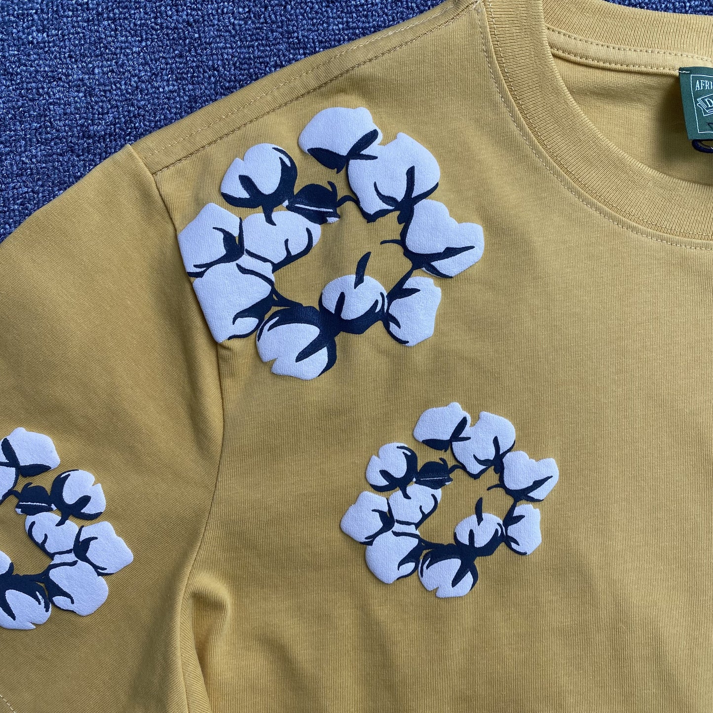 denim-tears-x-cpfm-cactus-tears-wreath-tee-yellow-4-Drip Store Argentina
