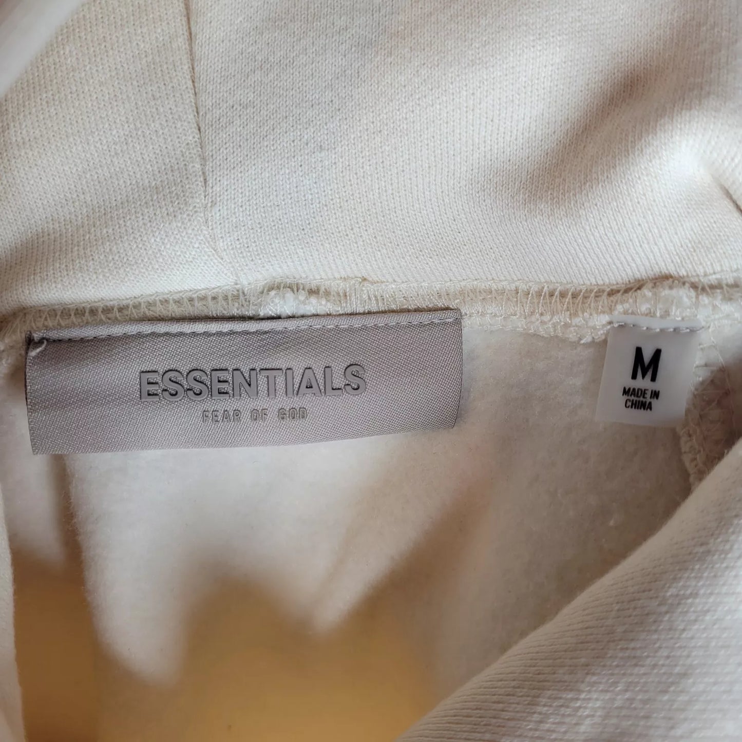 fear-of-god-essentials-hoodie-egg-shell-4-Drip Store Argentina