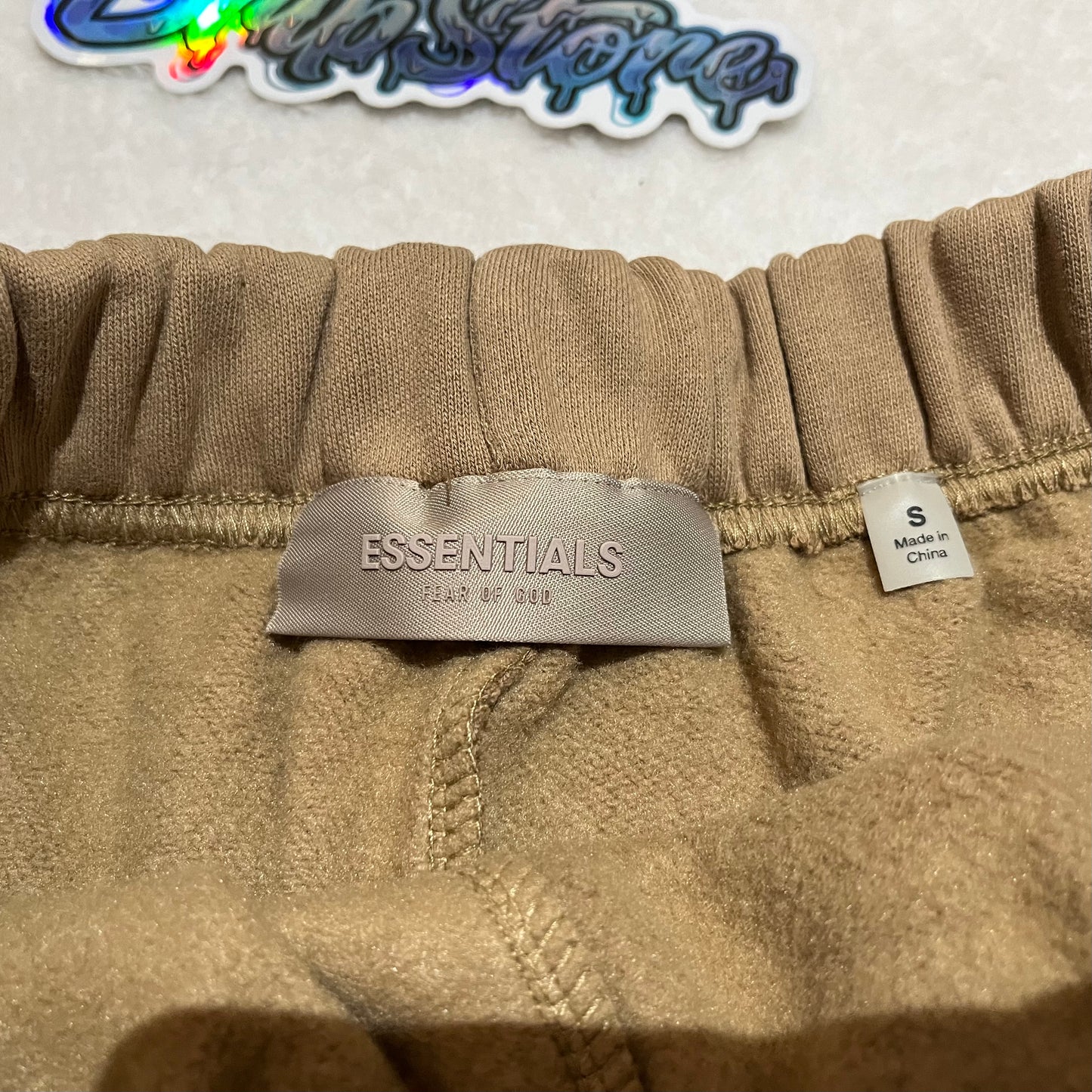 fear-of-god-essentials-shorts-oak-6-Drip Store Argentina
