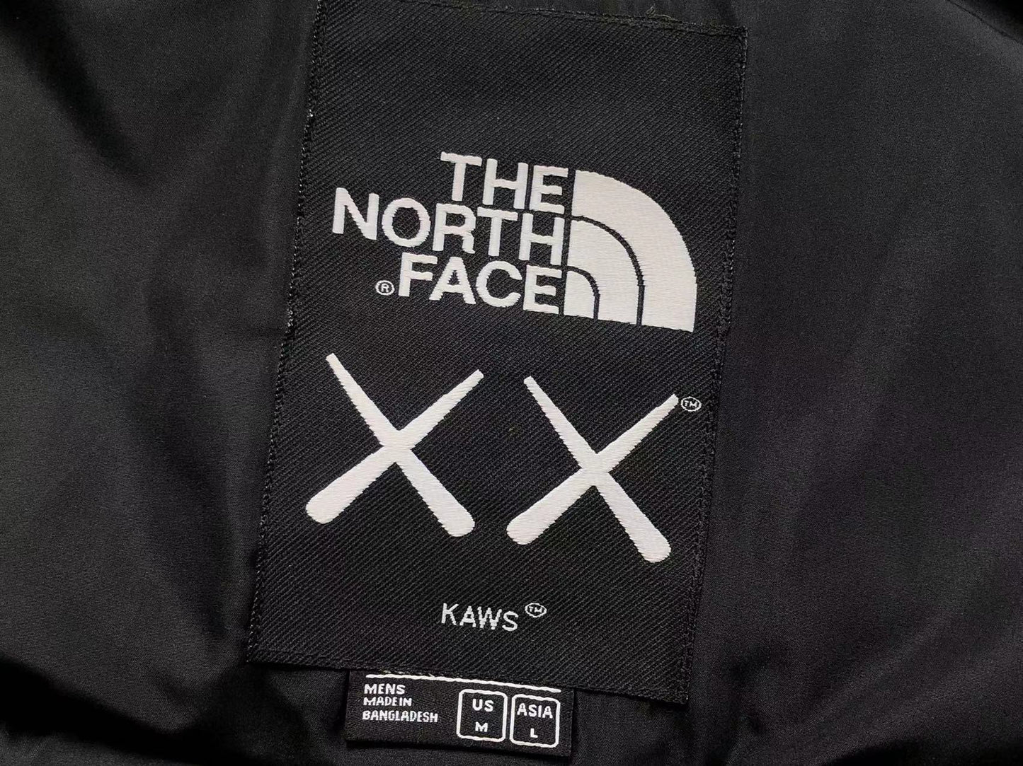KAWS X THE NORTH FACE RETRO 1996 NUPTSE JACKET BLACK-Drip Store Argentina