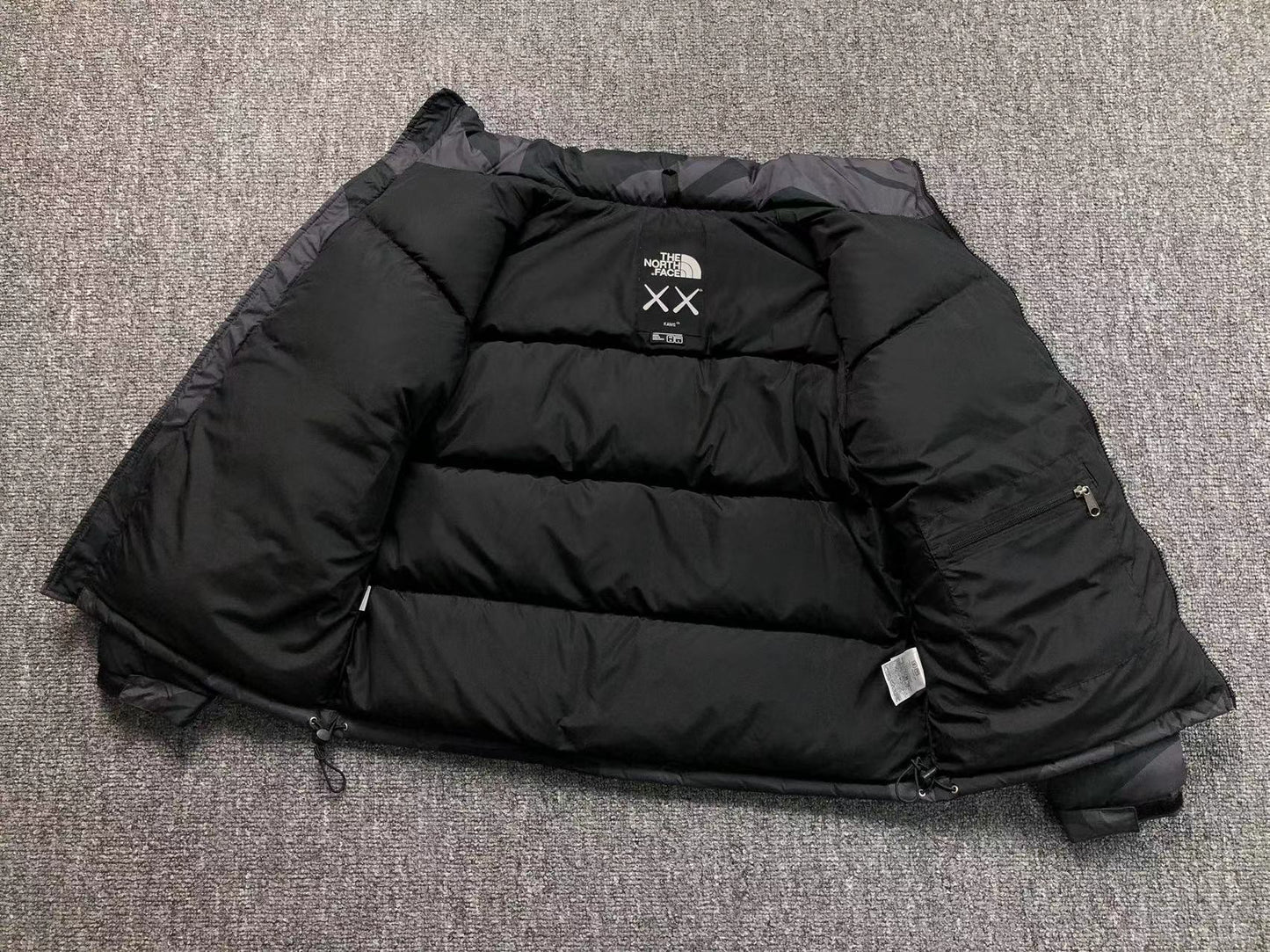 KAWS X THE NORTH FACE RETRO 1996 NUPTSE JACKET BLACK-Drip Store Argentina