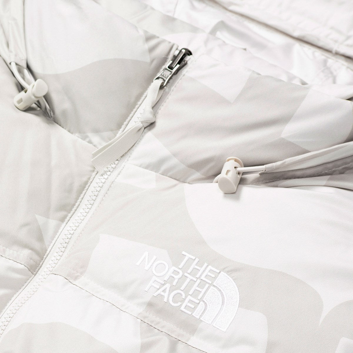 KAWS X THE NORTH FACE RETRO 1996 NUPTSE JACKET MOONLIGHT IVORY-Drip Store Argentina