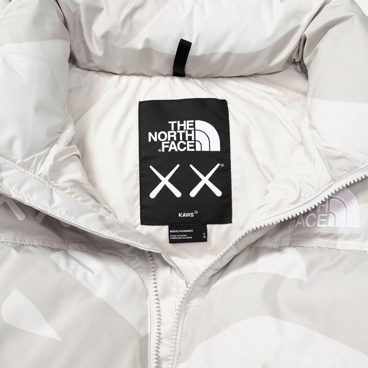 KAWS X THE NORTH FACE RETRO 1996 NUPTSE JACKET MOONLIGHT IVORY-Drip Store Argentina