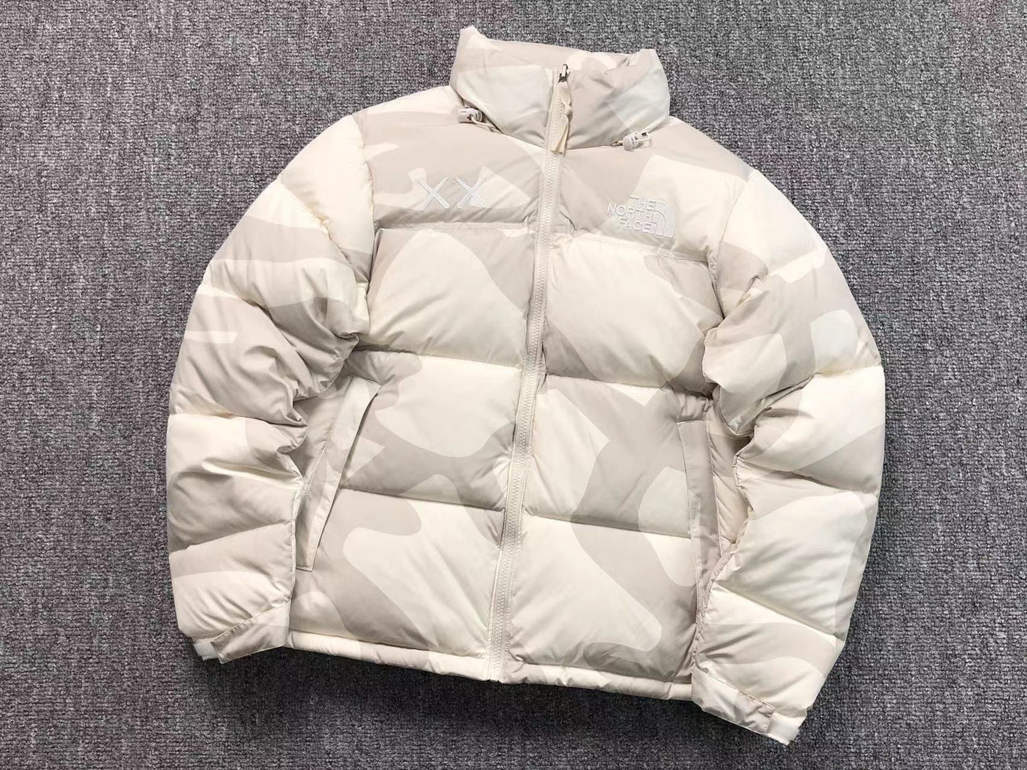 KAWS X THE NORTH FACE RETRO 1996 NUPTSE JACKET MOONLIGHT IVORY-Drip Store Argentina