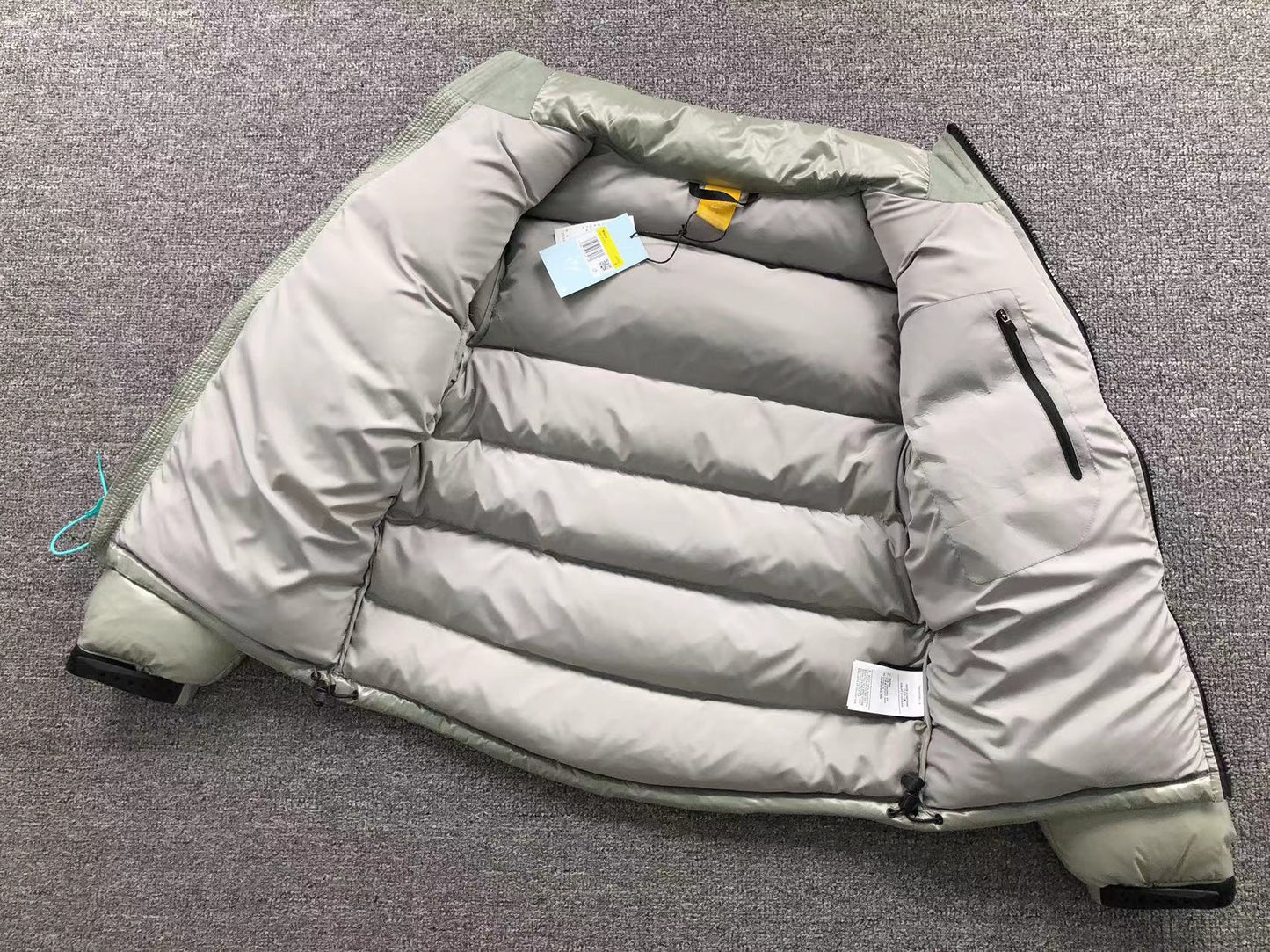 nike-x-nocta-sunset-puffer-jacket-mica-green-16-Drip Store Argentina