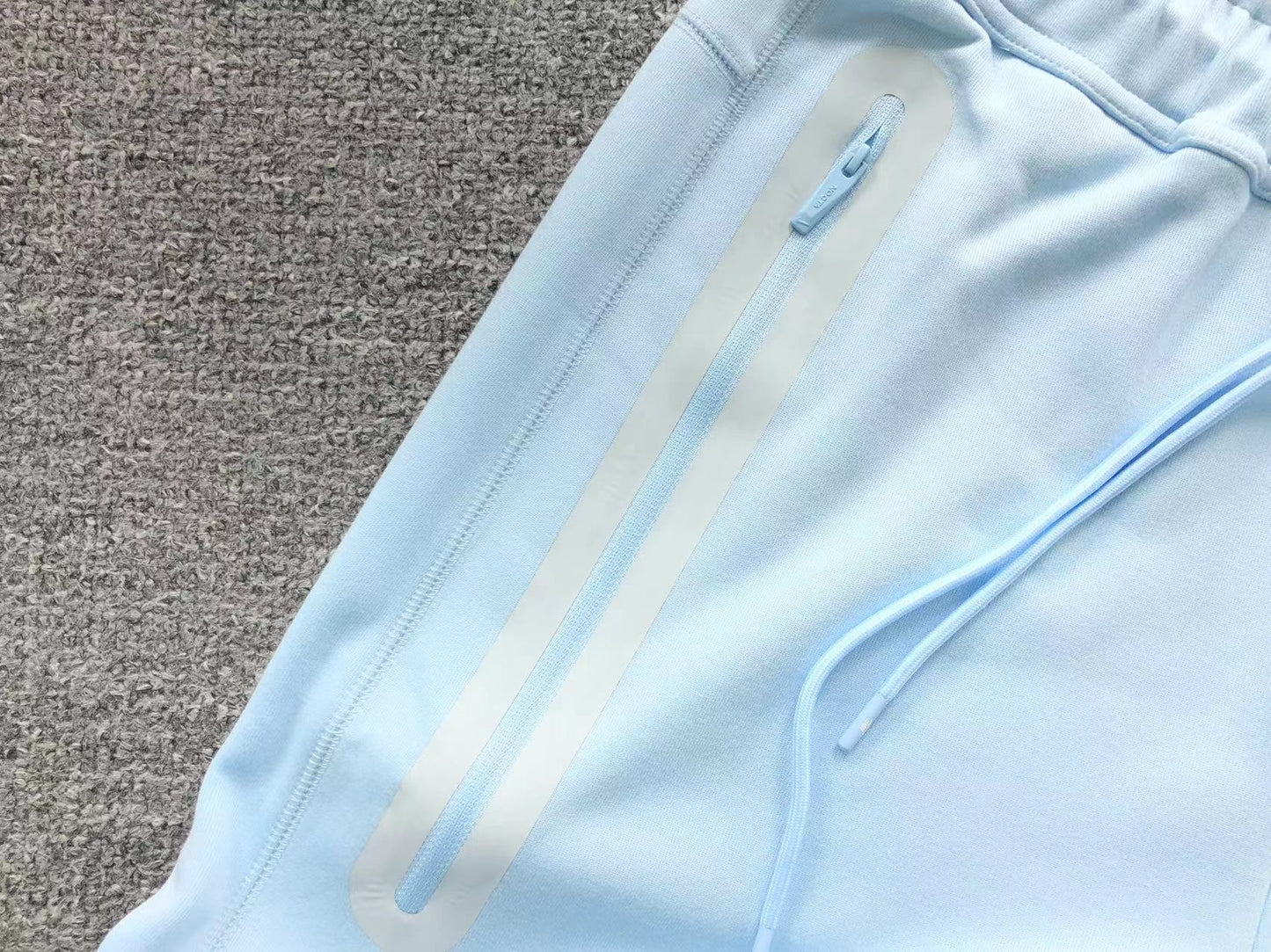 nike-x-nocta-tech-fleece-tracksuit-blue-7_3fd9be6f-Drip Store Argentina
