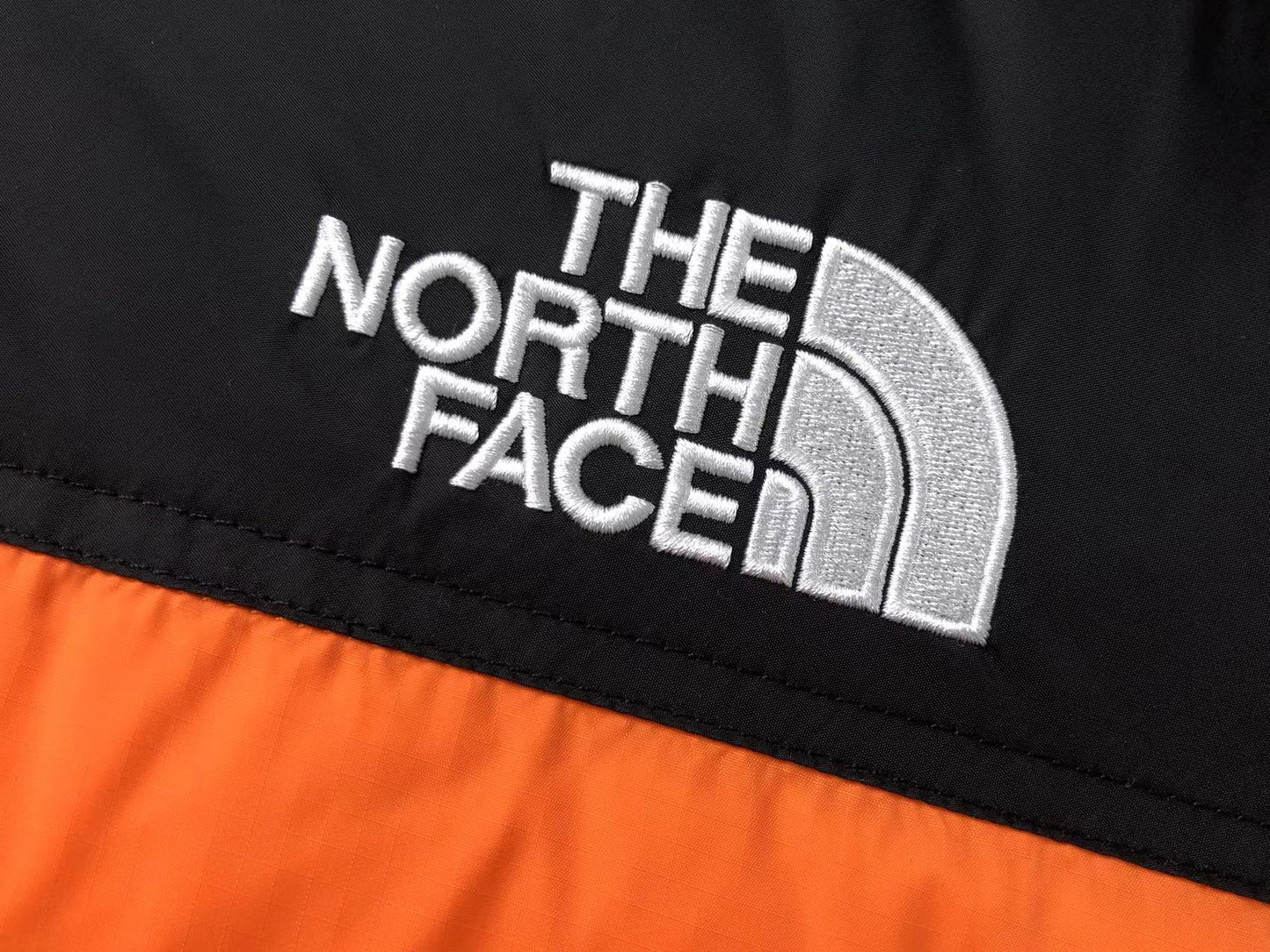 the-north-face-1996-retro-nuptse-700-fill-packable-jacket-orange-3-Drip Store Argentina