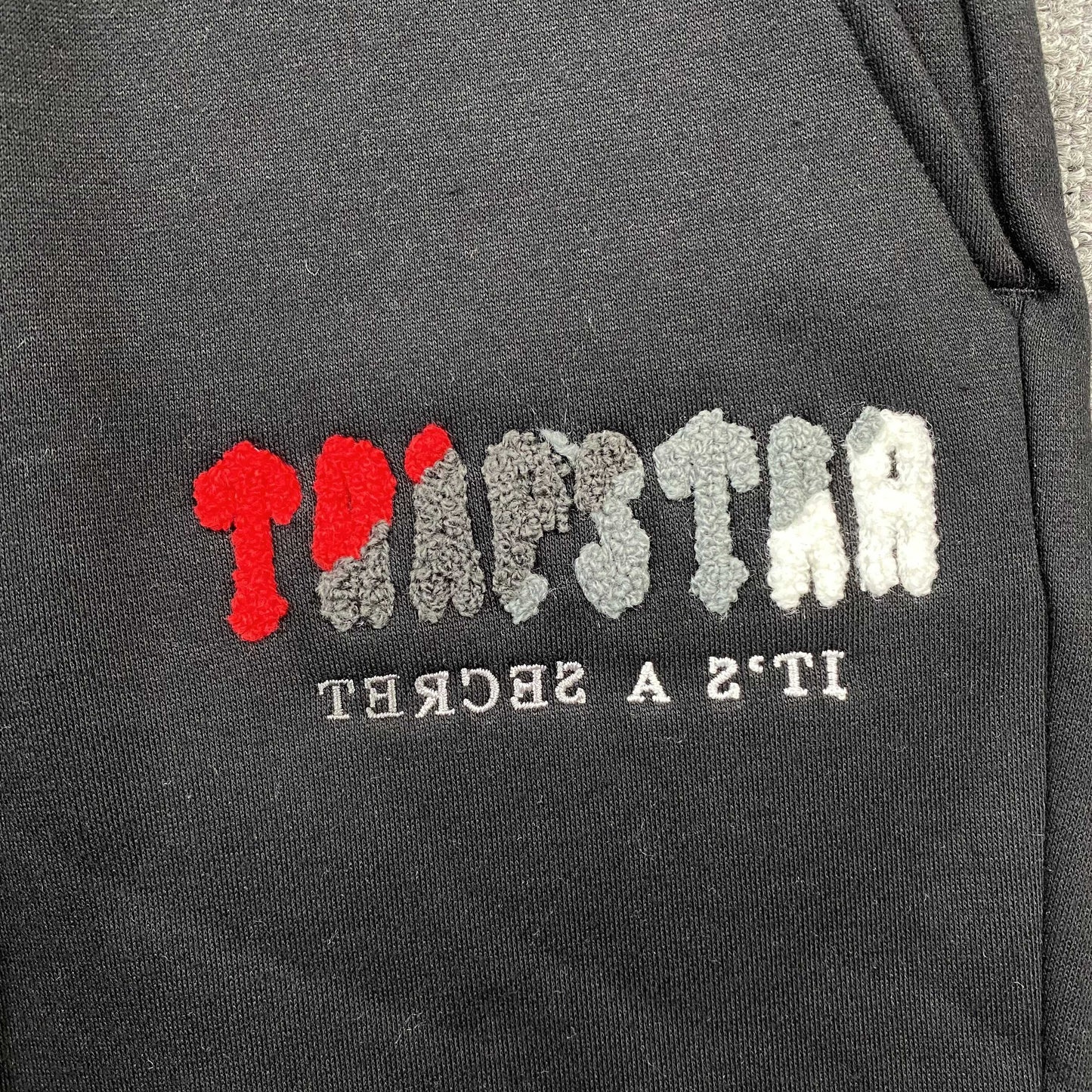 TRAPSTAR CHENILLE DECODED TRACKSUIT BLACK RED