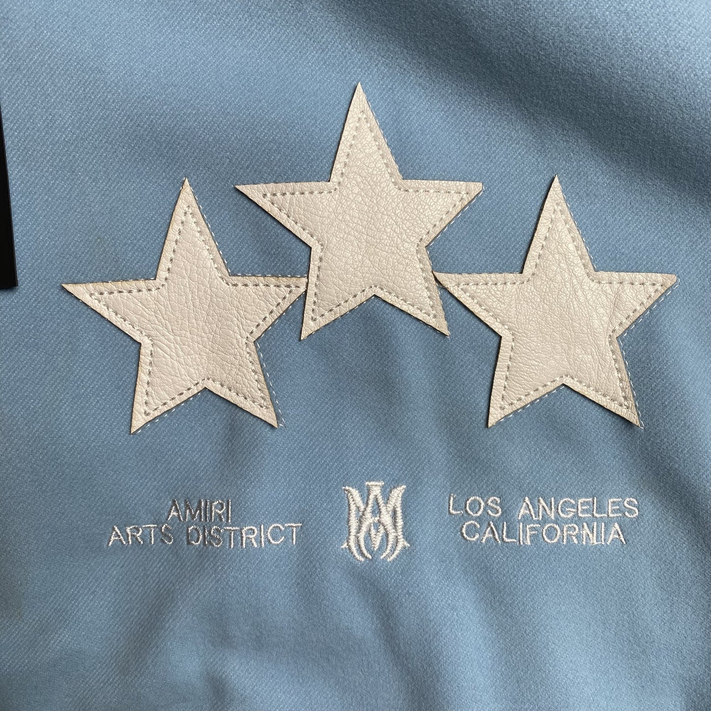 AMIRI STARS BOMBER JACKET AIR BLUE