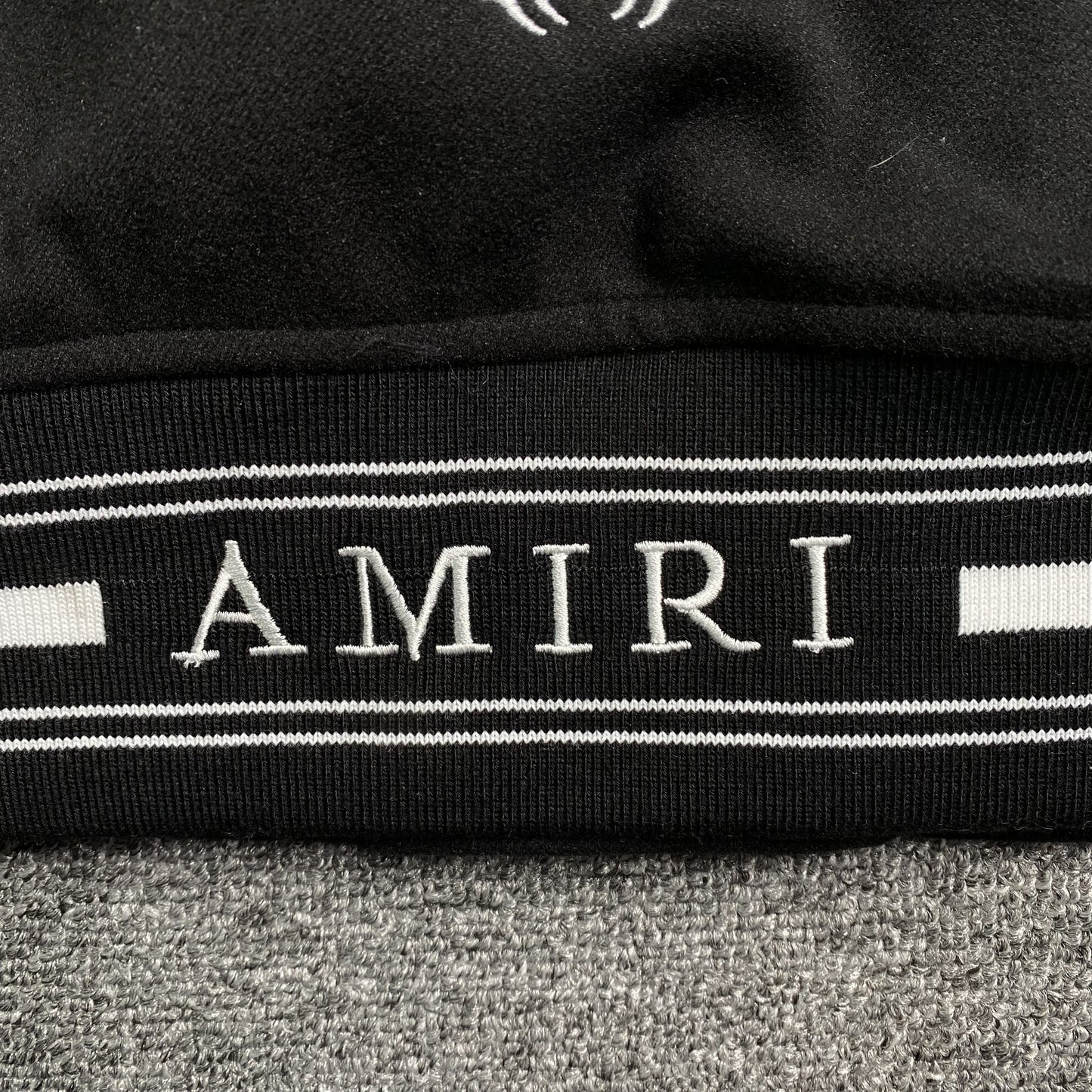 AMIRI LOGO PATCH VARSITY JACKET BLACK