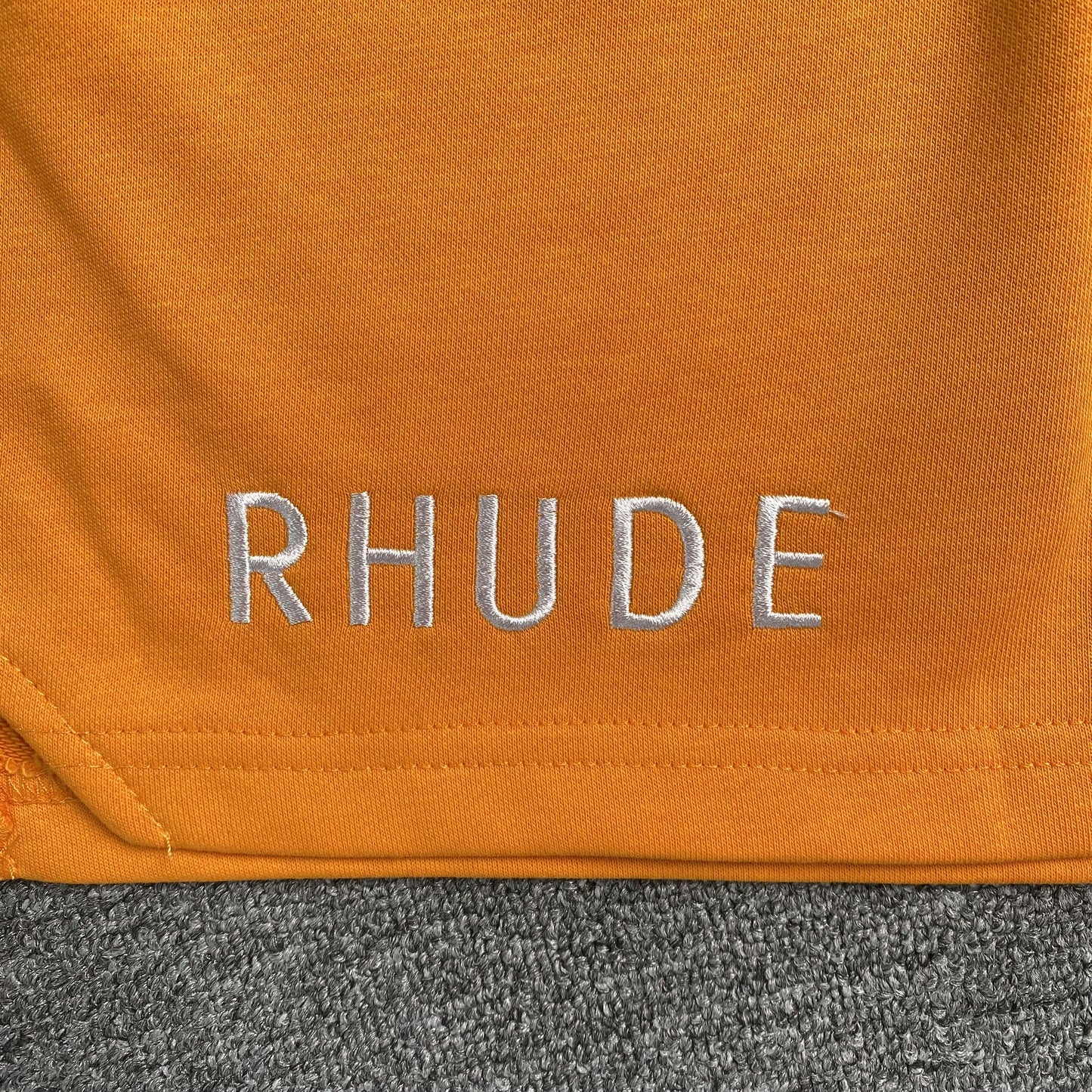 RHUDE X MCLAREN SHORTS ORANGE