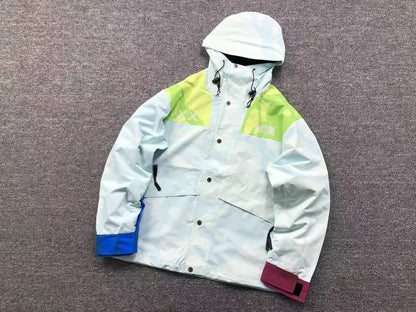 KAWS X THE NORTH FACE RETRO 1986 MOUNTAIN JACKET ICE BLUE 86