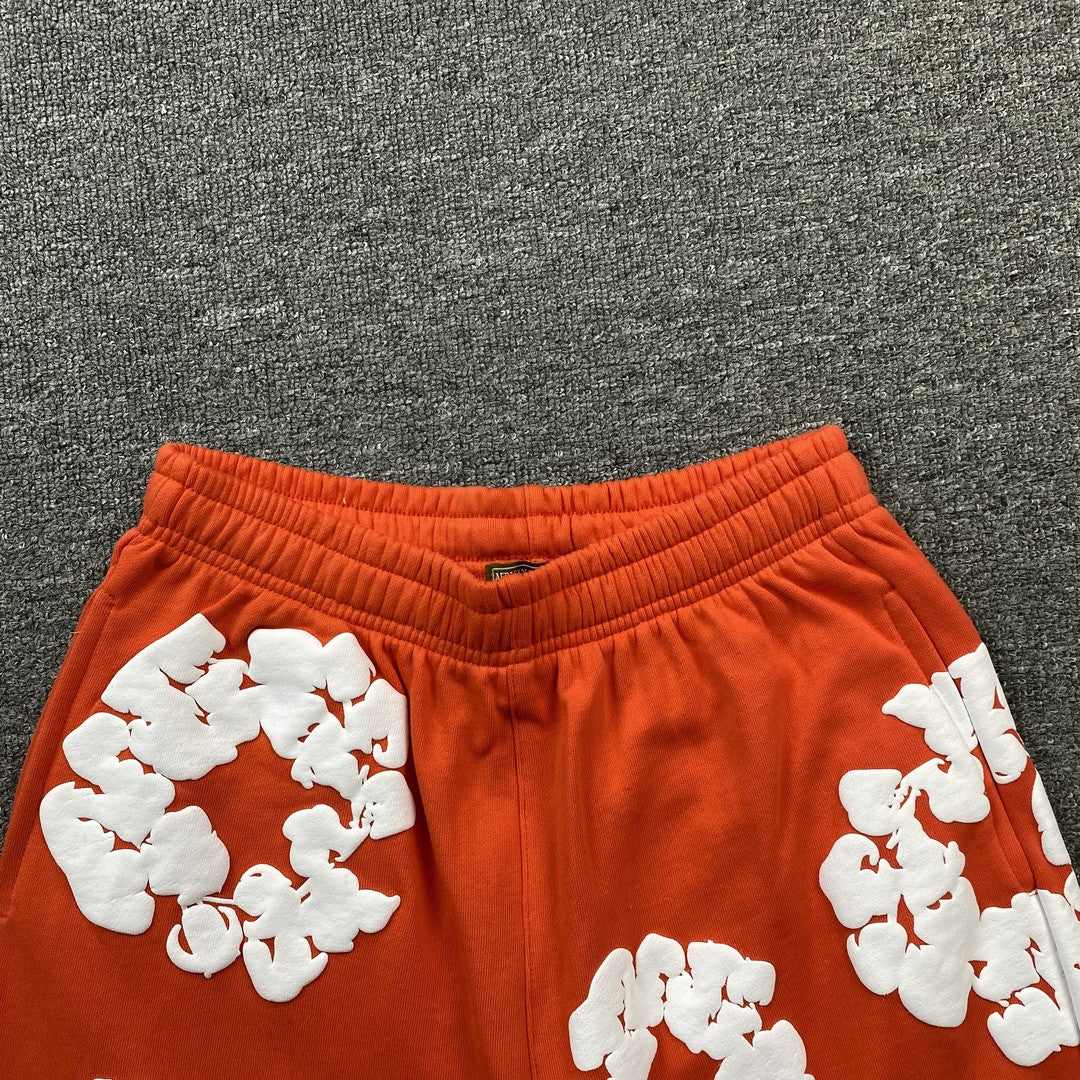 DENIM TEARS THE COTTON WREATH SHORTS ORANGE