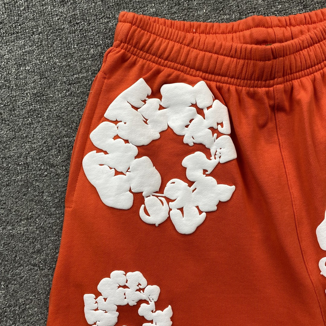 DENIM TEARS THE COTTON WREATH SHORTS ORANGE