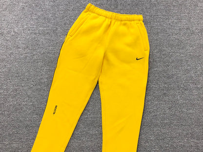 NIKE X DRAKE NOCTA FLEECE PANTS YELLOW