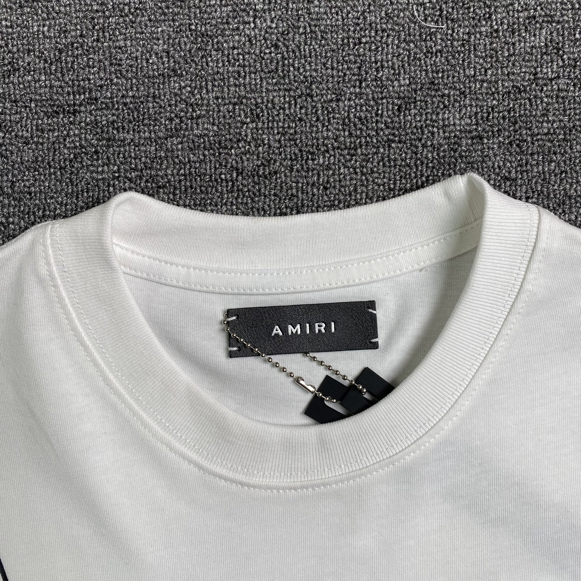 amiri-collegiate-tee-white-5_159ddd08-Drip Store Argentina