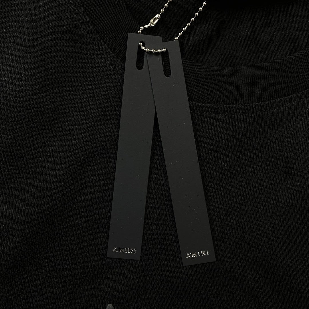 AMIRI STAGGERED LOGO TEE BLACK