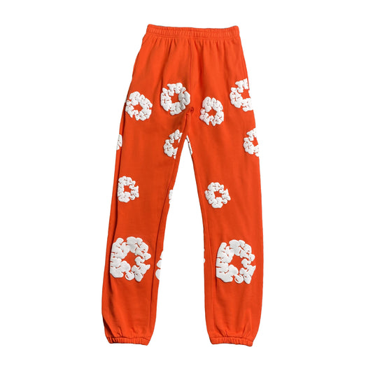 DENIM TEARS THE COTTON WREATH SWEATPANTS ORANGE