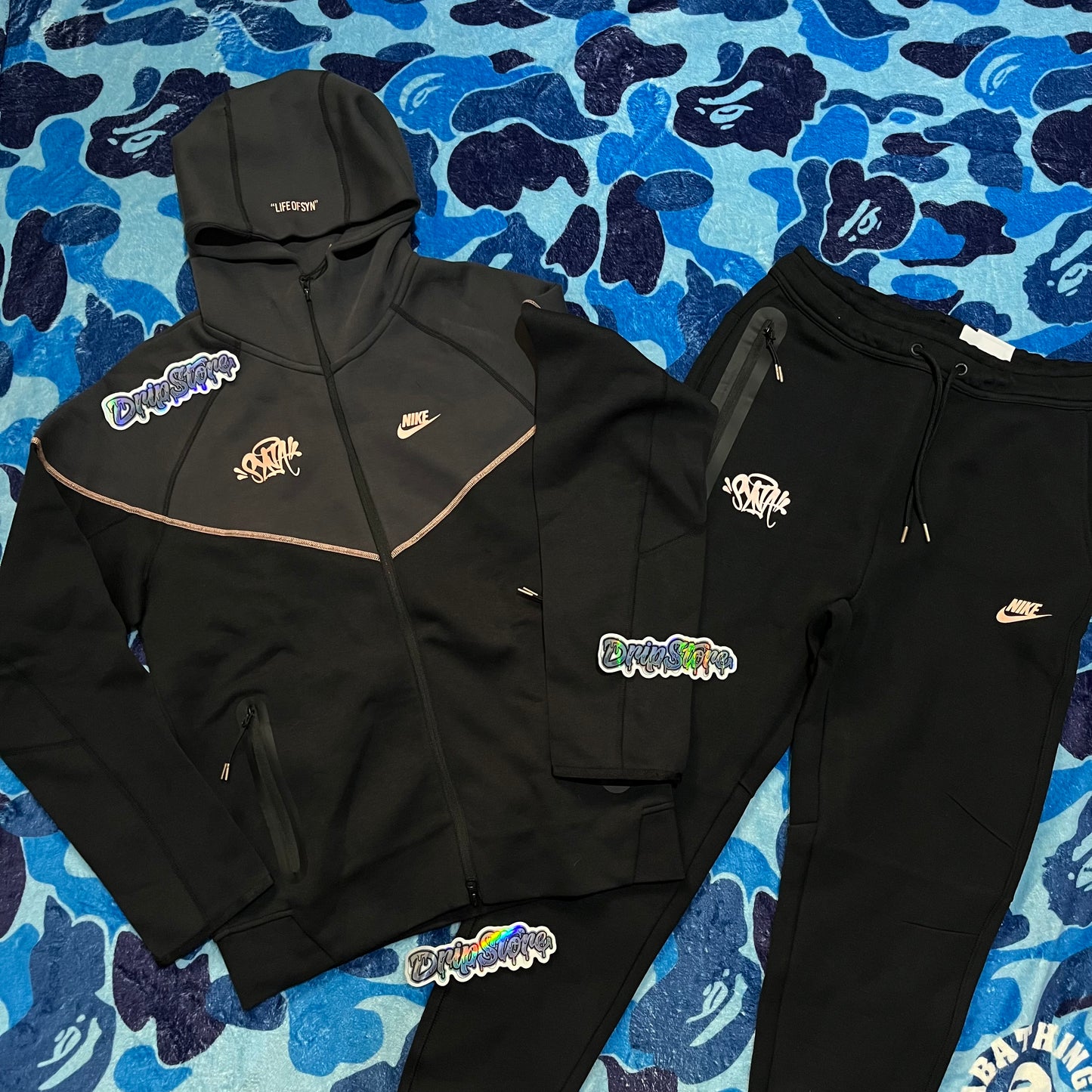 Conjunto Nike X Syna World Tech M