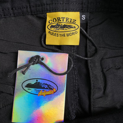 corteiz-guerillaz-cargos-triple-black-8-Drip Store Argentina