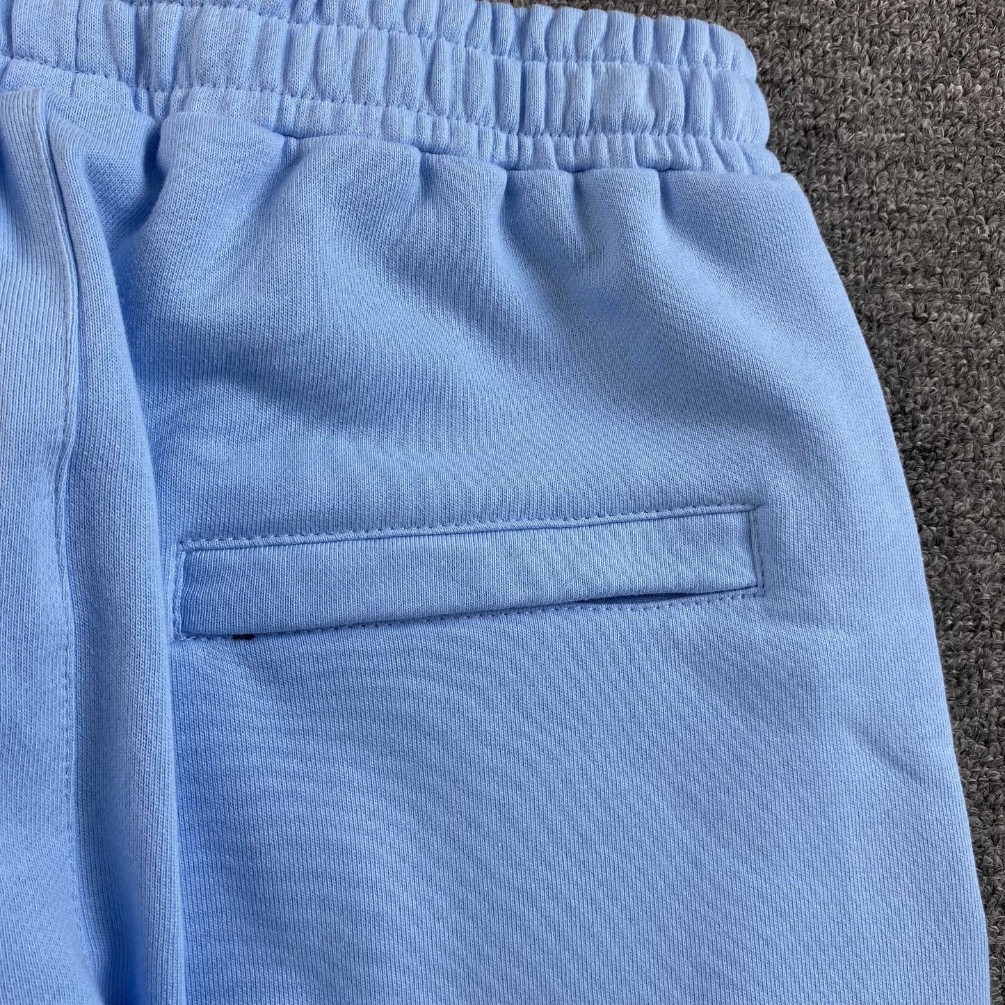 Corteiz Island Puff Print Open Hem Pants Baby Blue