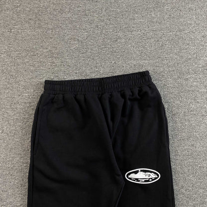 Corteiz Island Puff Print Open Hem Pants Black
