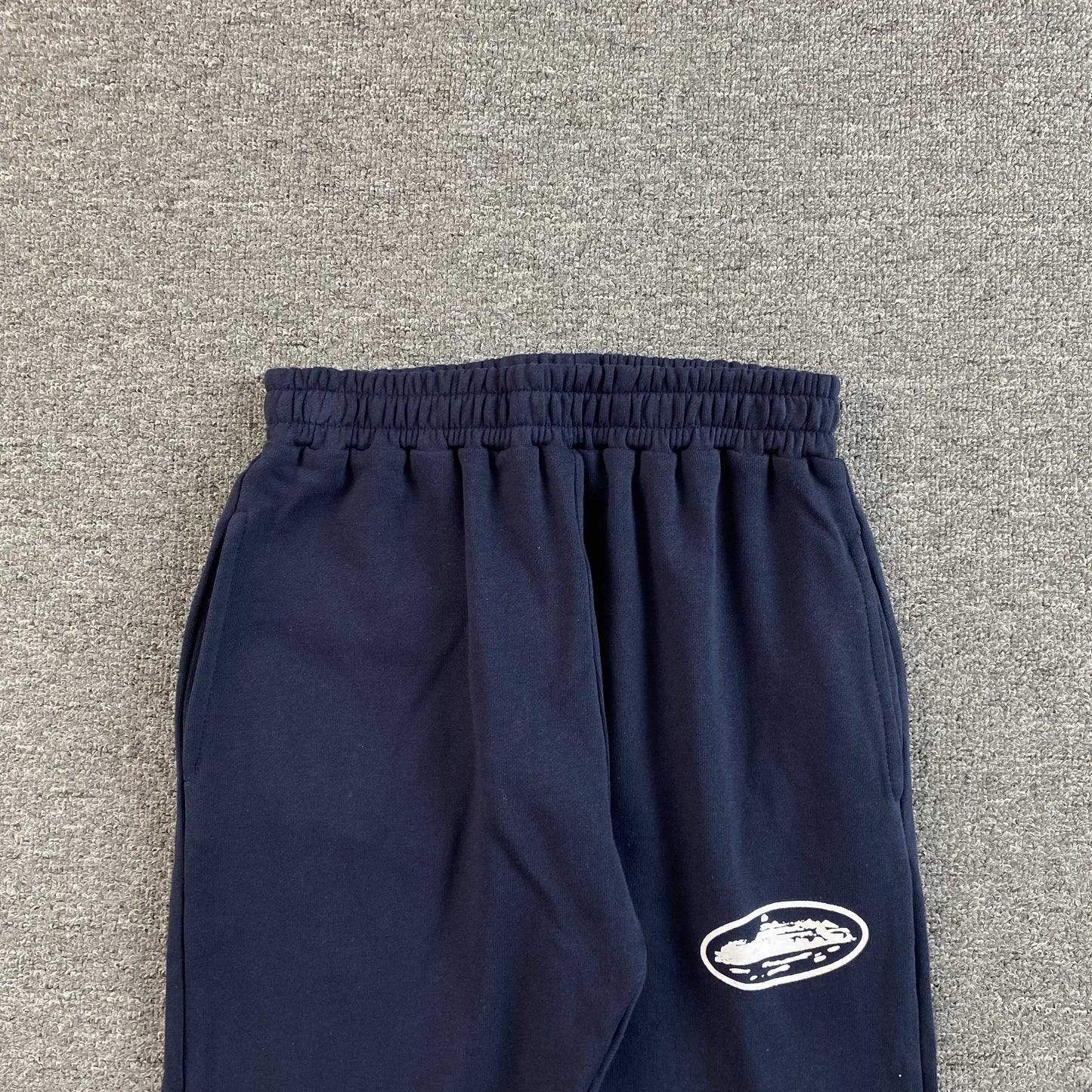 Corteiz Island Puff Print Open Hem Pants Navy