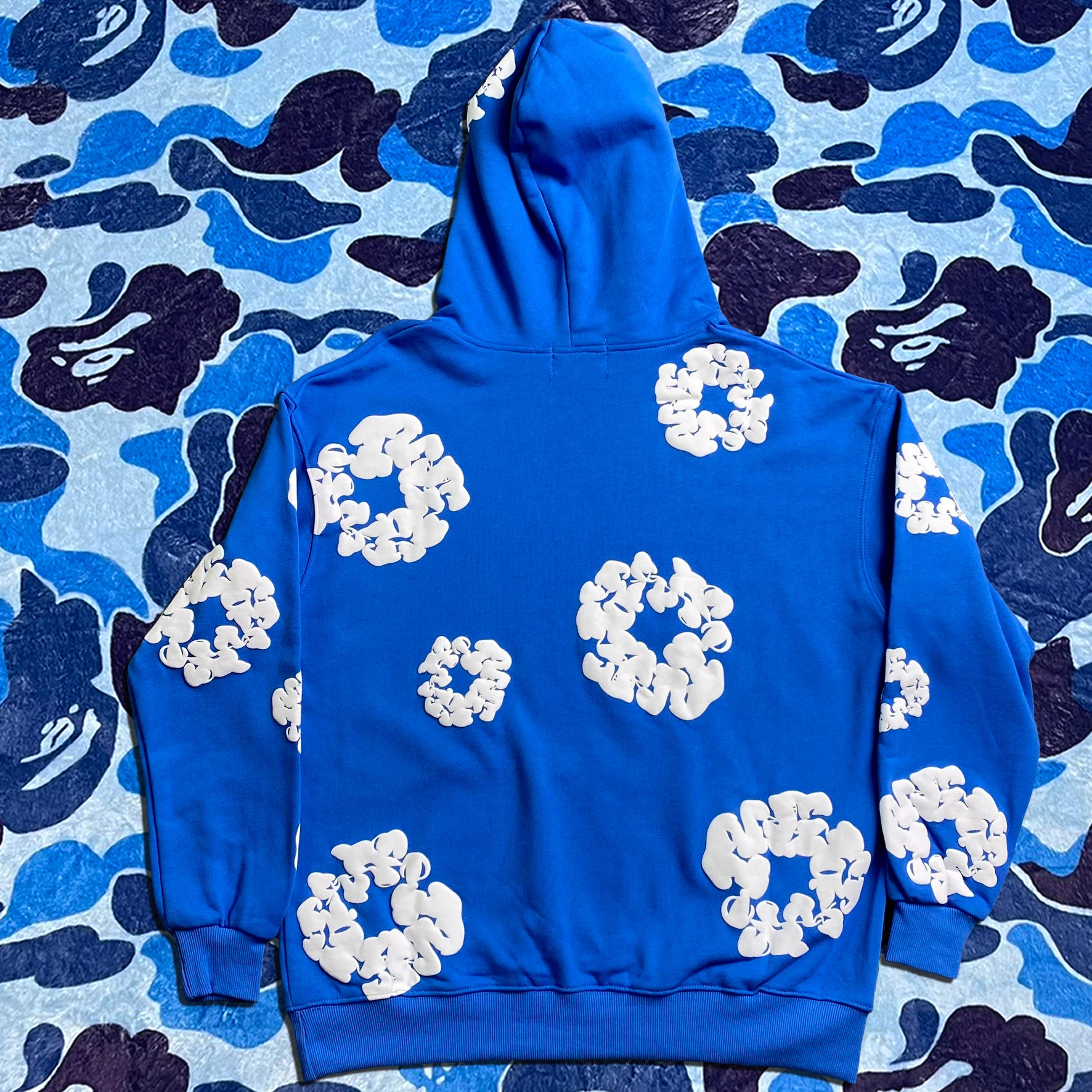 denim-tears-the-cotton-wreath-hoodie-royal-blue-2-Drip Store Argentina