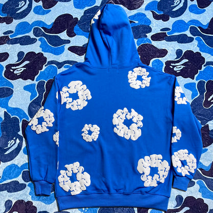 denim-tears-the-cotton-wreath-hoodie-royal-blue-2-Drip Store Argentina