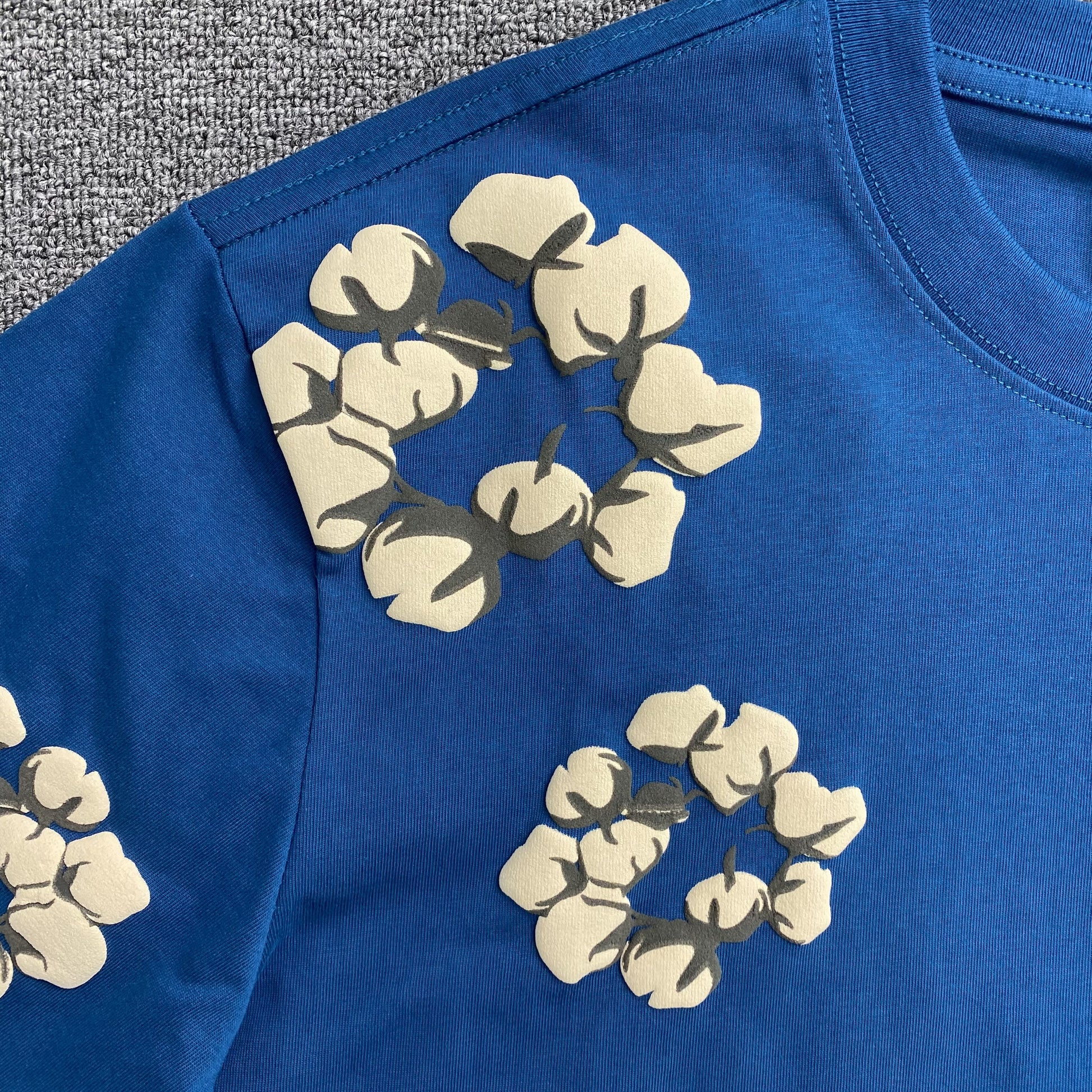 denim-tears-x-cpfm-cactus-tears-wreath-tee-blue-3-Drip Store Argentina