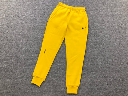 NIKE X DRAKE NOCTA FLEECE PANTS YELLOW