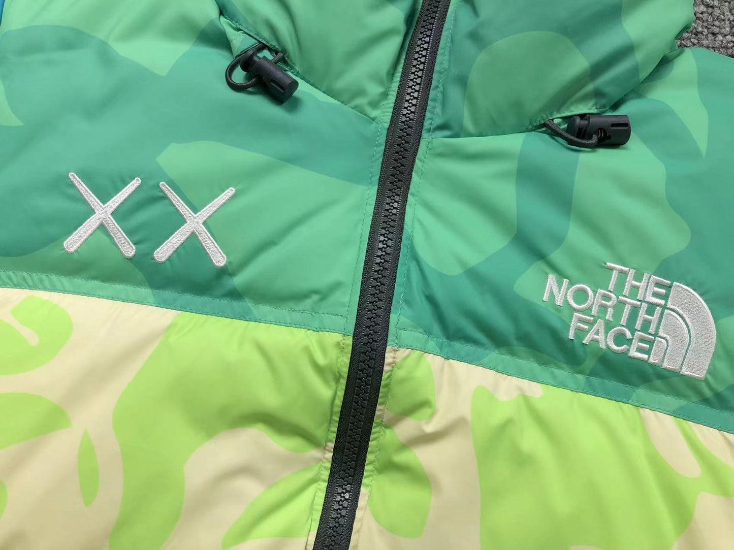 kaws-x-the-north-face-retro-1996-nuptse-jacket-safety-green-3-Drip Store Argentina