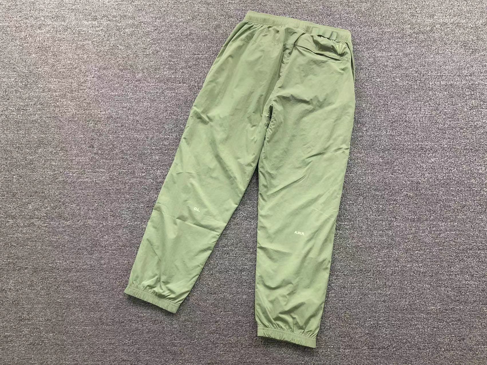nike-x-drake-nocta-track-pants-oil-green-2-Drip Store Argentina