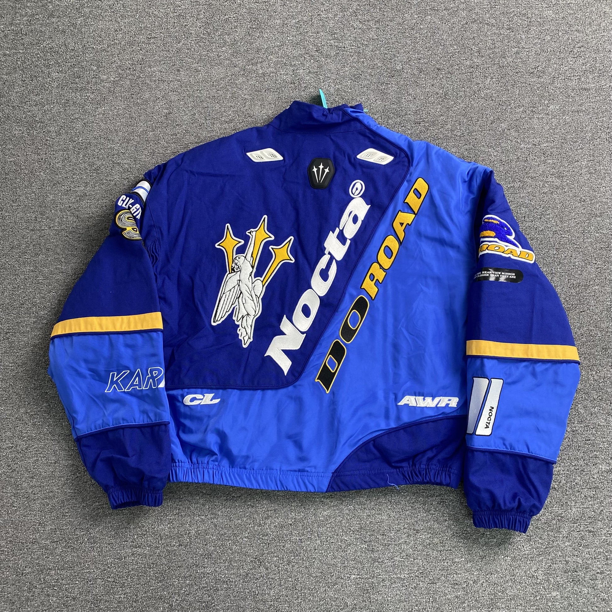 nike-x-nocta-lart-racing-jacket-deep-royal-blue-2-Drip Store Argentina