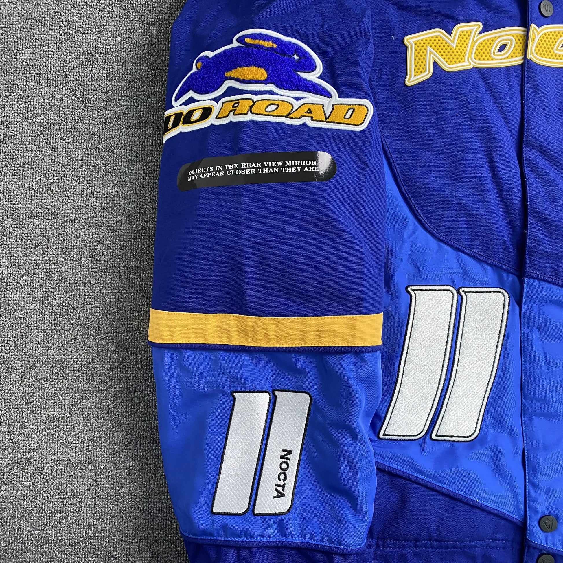 nike-x-nocta-lart-racing-jacket-deep-royal-blue-8-Drip Store Argentina