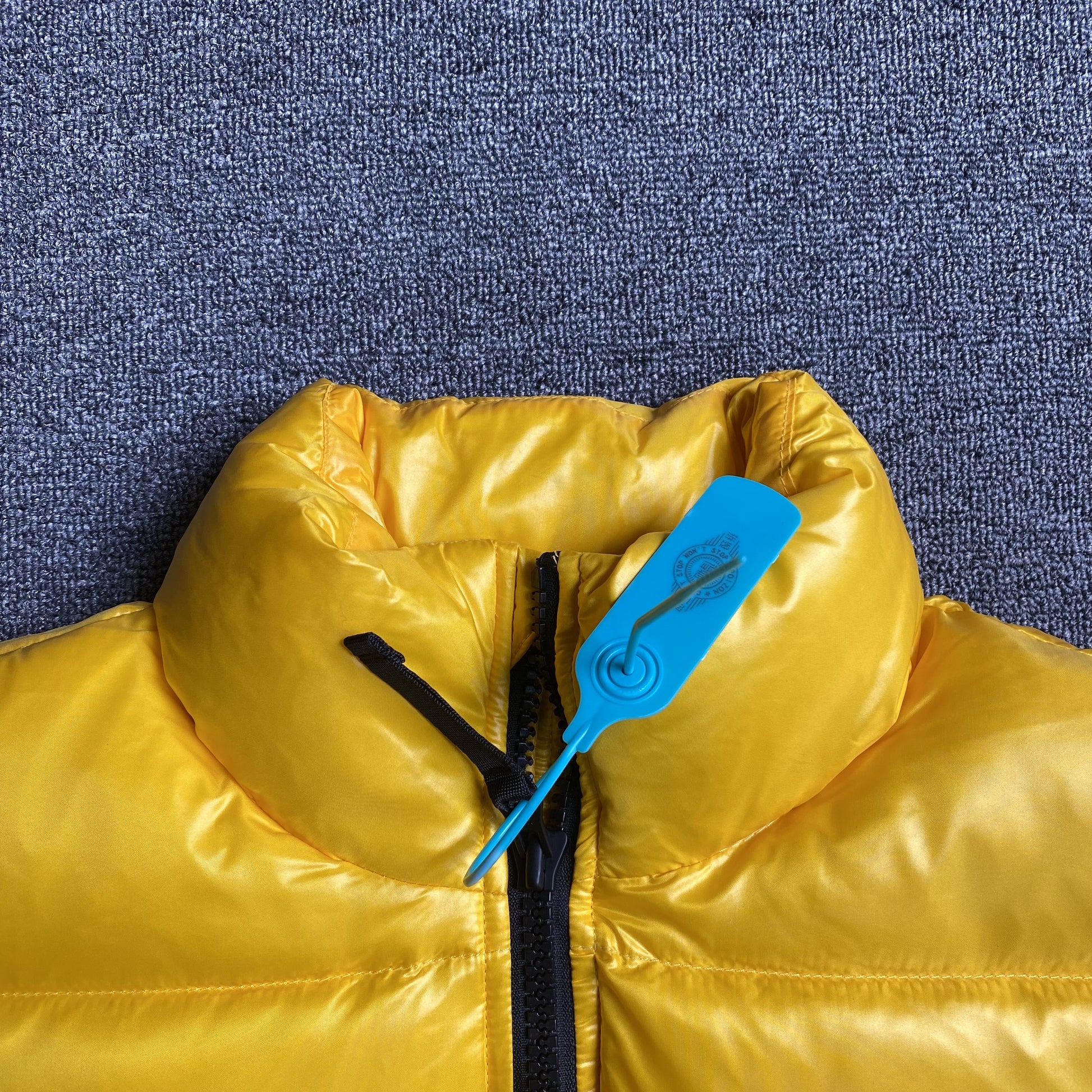 nike-x-nocta-sunset-puffer-jacket-yellow-11-Drip Store Argentina