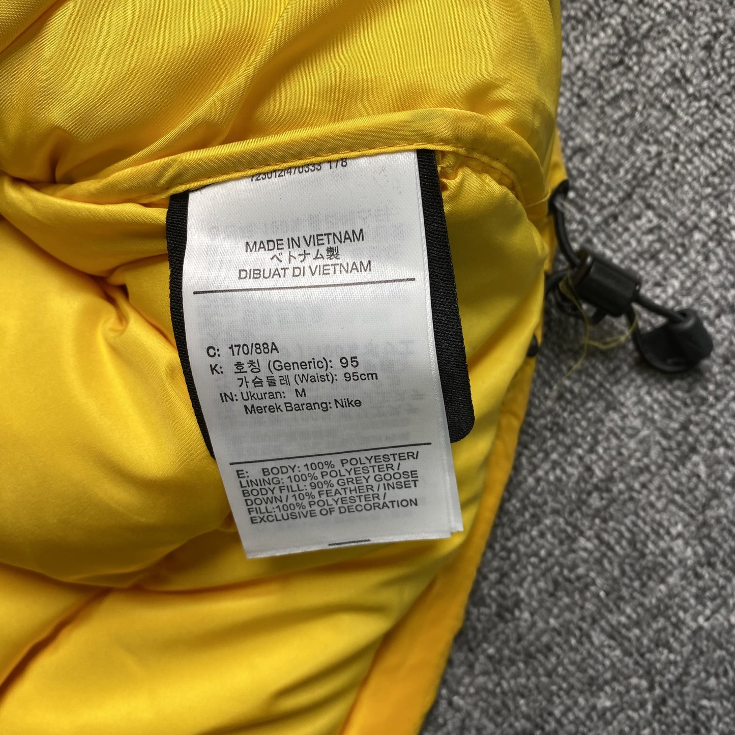 nike-x-nocta-sunset-puffer-jacket-yellow-14-Drip Store Argentina