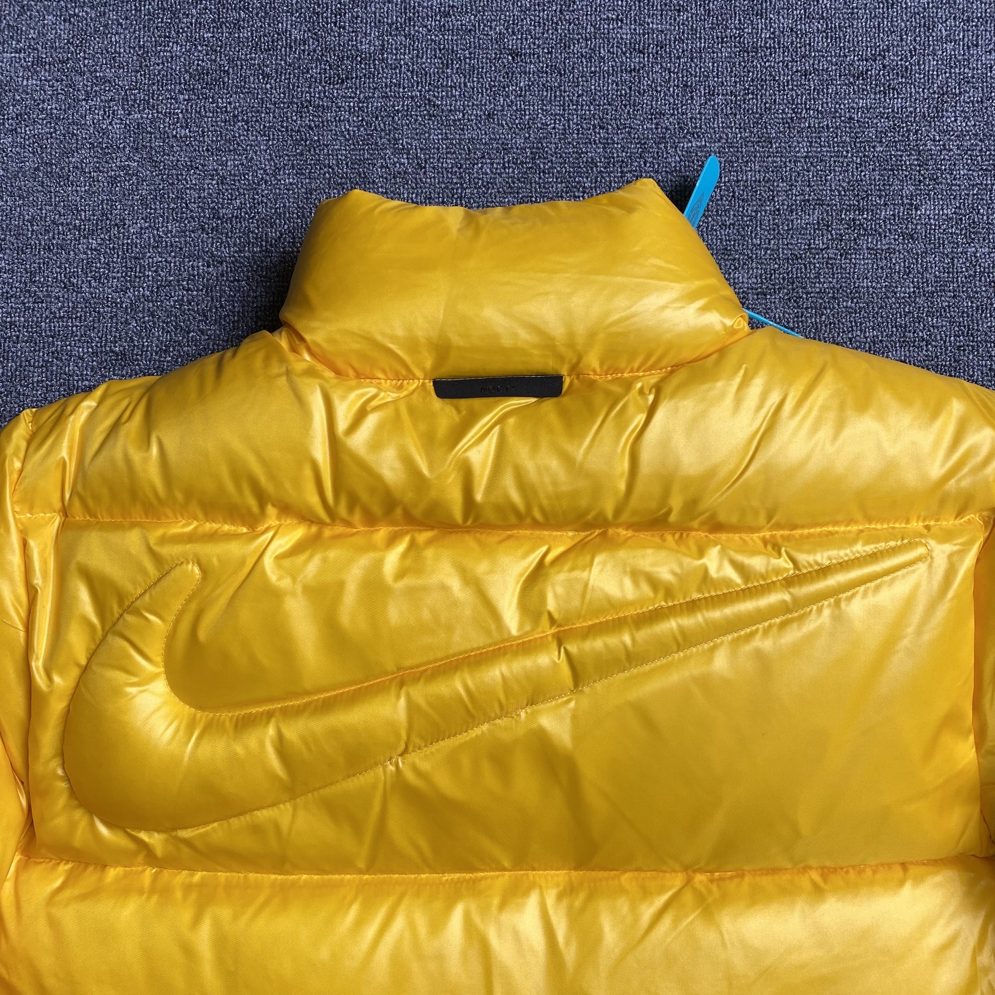 nike-x-nocta-sunset-puffer-jacket-yellow-3-Drip Store Argentina