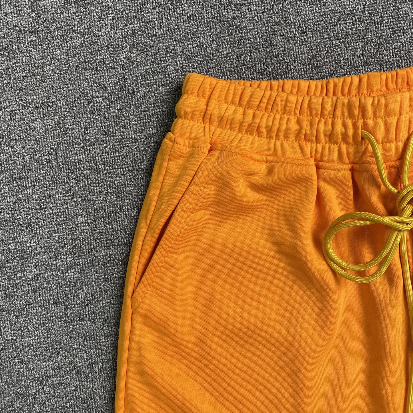 rhude-x-mclaren-shorts-orange-7-Drip Store Argentina
