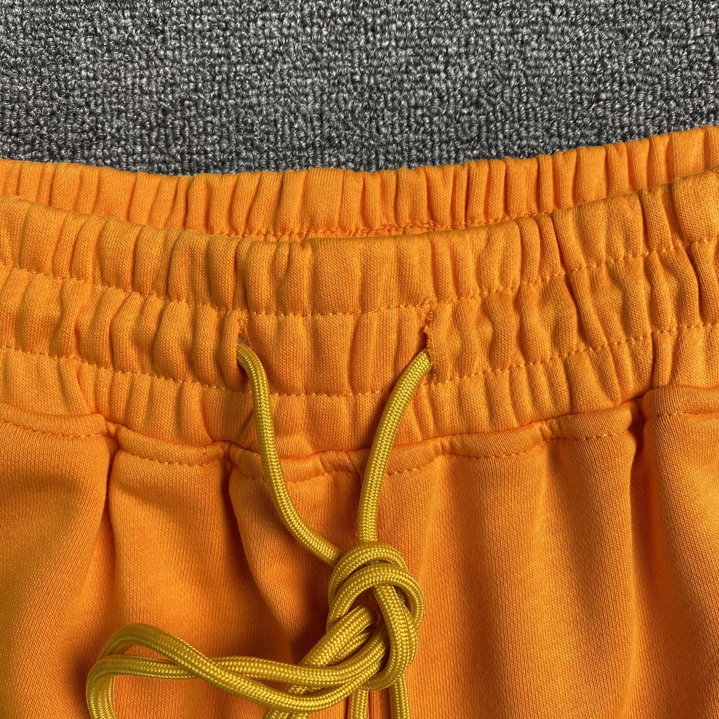 rhude-x-mclaren-shorts-orange-8-Drip Store Argentina