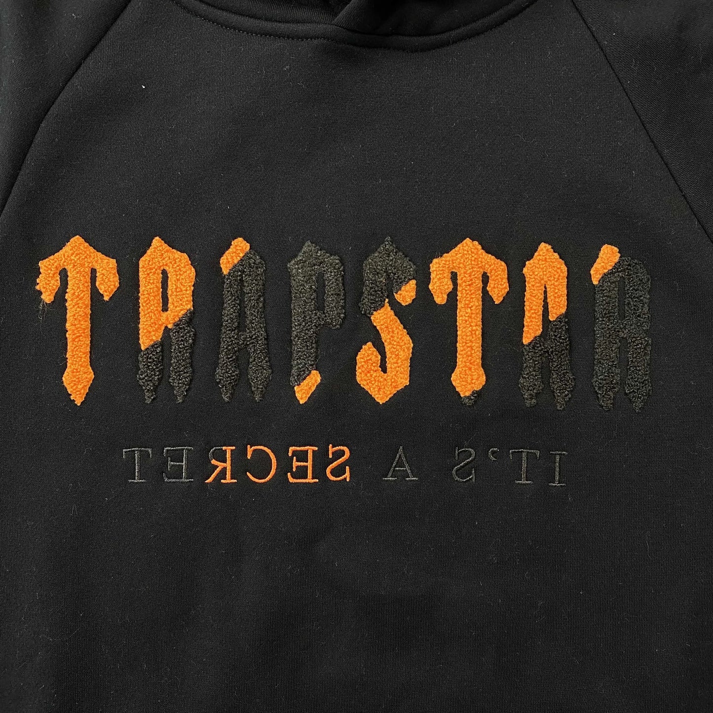 trapstar-chenille-decoded-tracksuit-black-orange-2-Drip Store Argentina