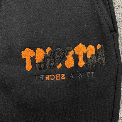 trapstar-chenille-decoded-tracksuit-black-orange-5-Drip Store Argentina