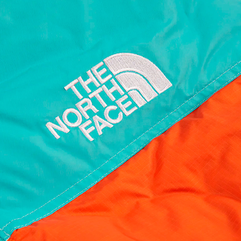 the-north-face-1996-retro-nuptse-700-fill-packable-jacket-red-orange-transantarctic-blue-4-Drip Store Argentina